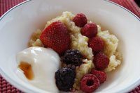 Hot cereal with berries and yogurt