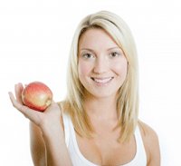 woman holding an apple