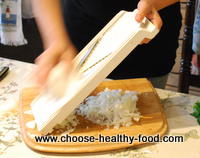 slicing veggies for stuffing of collard greens